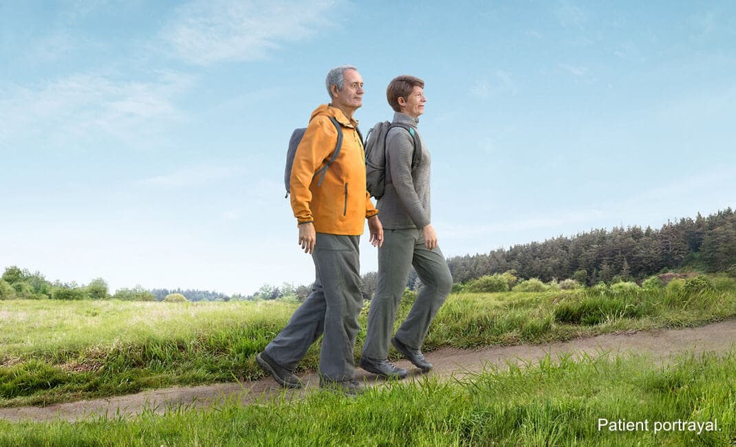 man and woman hiking